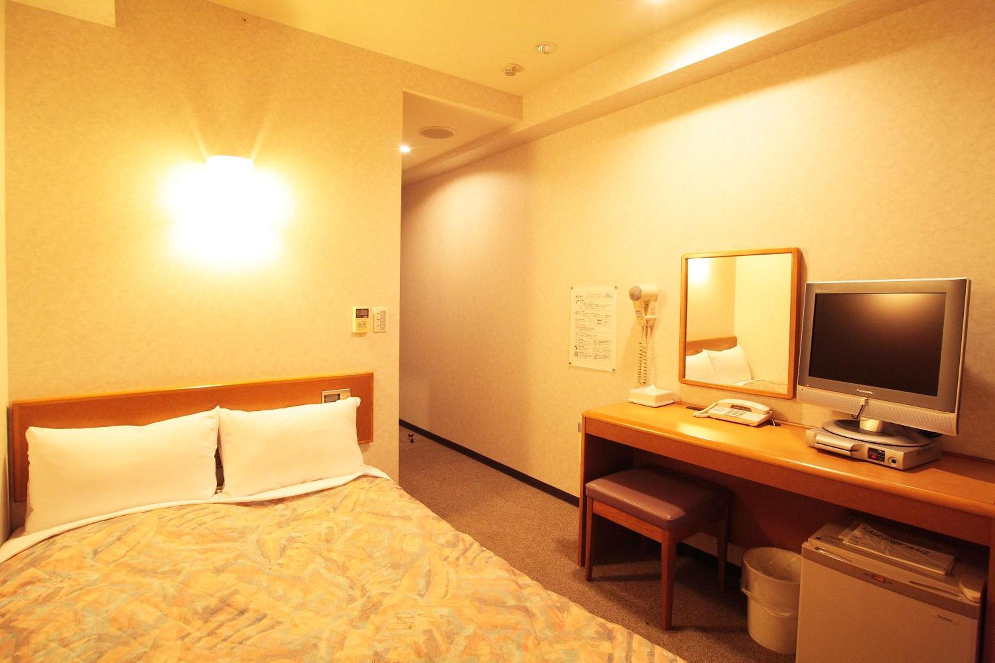 Hotel New Budget Szapporo Szoba fotó