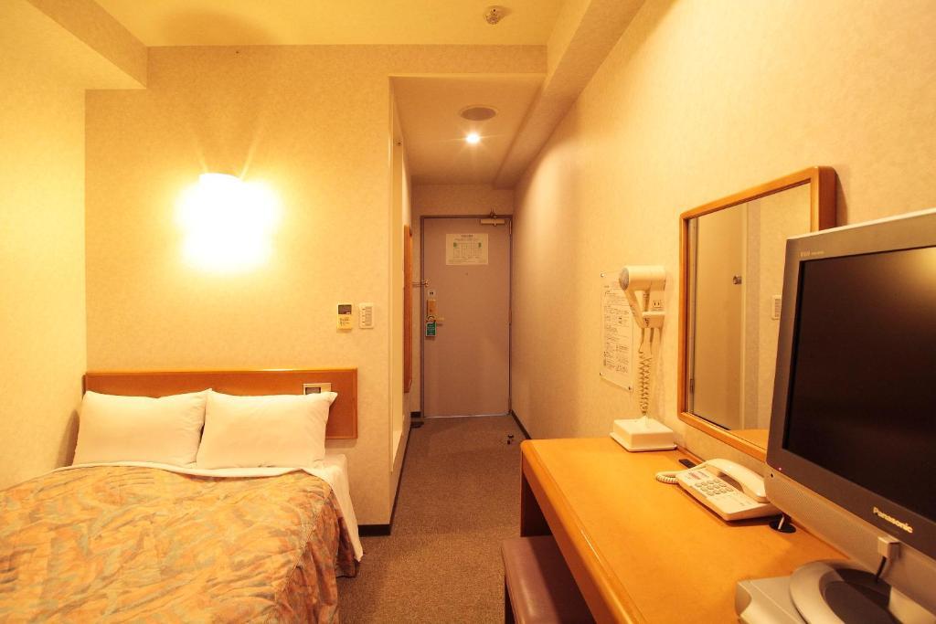 Hotel New Budget Szapporo Szoba fotó